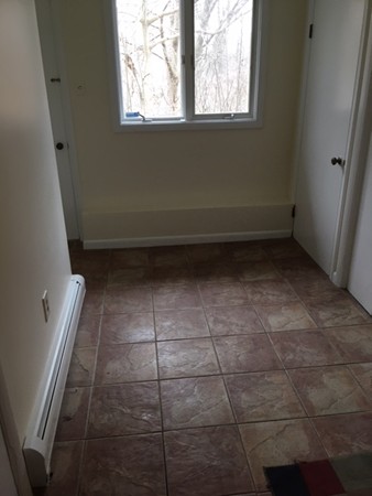 9 West Knoll Road Andover, MA 01810 - Photo 12 of 16 an empty room with a window