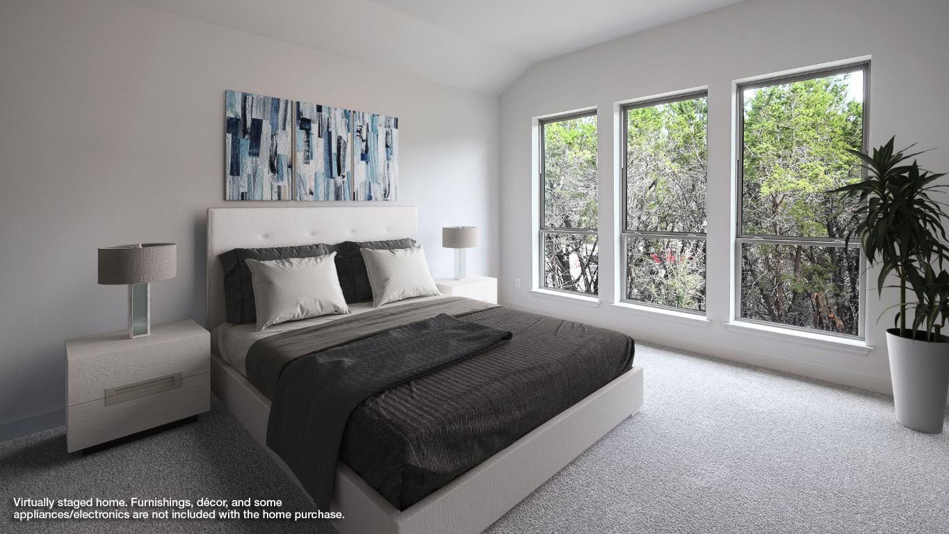 208 High Rock Pass Kyle, TX 78640 - Photo 6 of 40 Carpeted bedroom with lofted ceiling