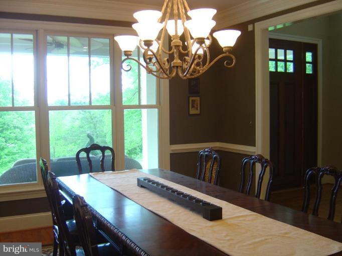 16820 Whites Store Road Boyds, MD 20841 - Photo 17 of 30 a view of a dining room with furniture window and outside view