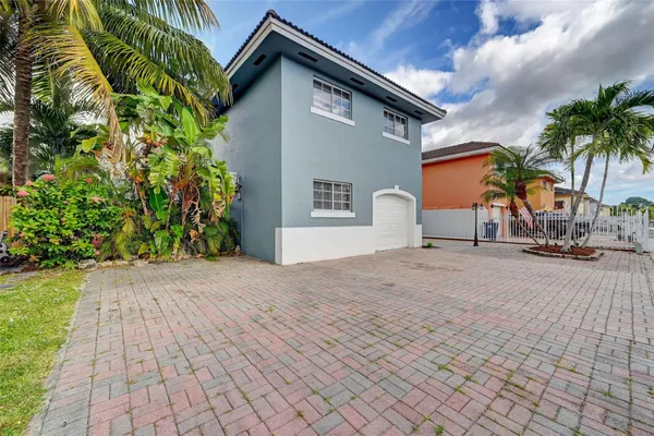 a view of outdoor space and yard