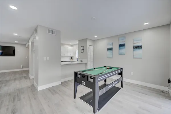 a room with a table and chairs