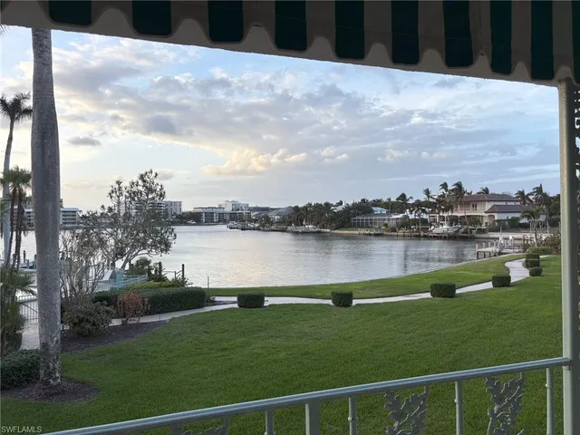 a view of a lake from a balcony