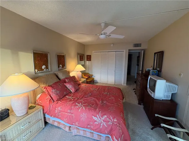 a view of a swimming pool with a roof deck