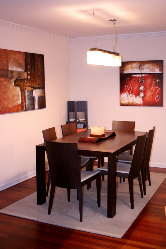 111 East Chestnut Street, Unit 45B Chicago, IL 60611 - Photo 6 of 27 a view of a dining room with furniture and wooden floor
