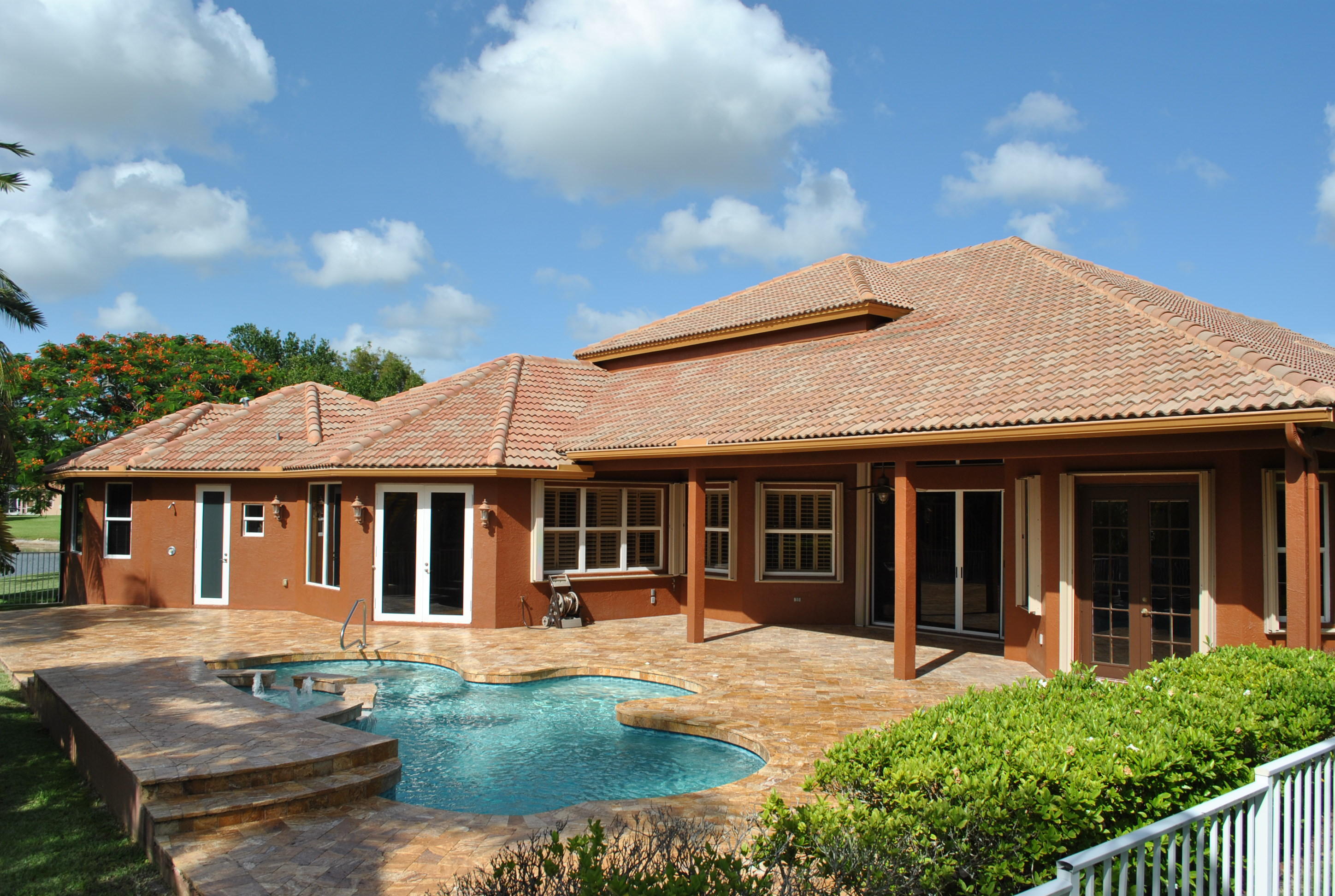 12726 Torbay Drive Boca Raton, FL 33428 - Photo 6 of 36 Pool deck and covered patio
