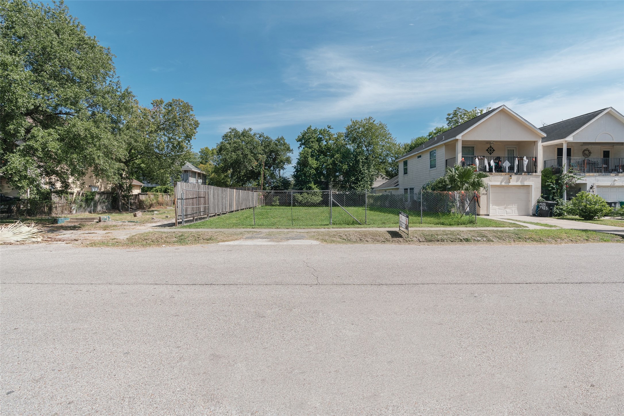 0 McKee Street Houston, TX 77009 - Photo 2 of 7 a view of street along with house and trees
