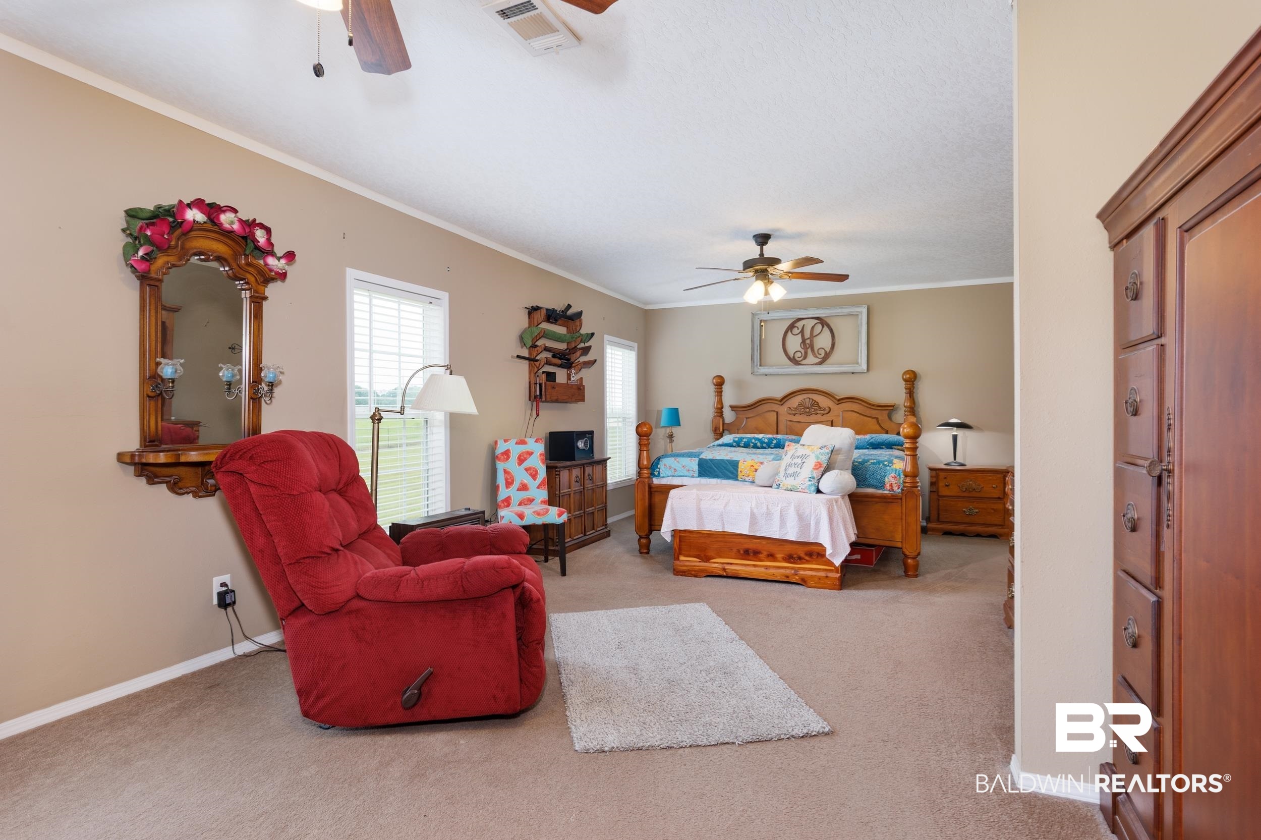 6725 Upper Creek Road Flomaton, AL 36441 - Photo 48 of 61 Bedroom with carpet floors, ornamental molding, baseboards, and ceiling fan