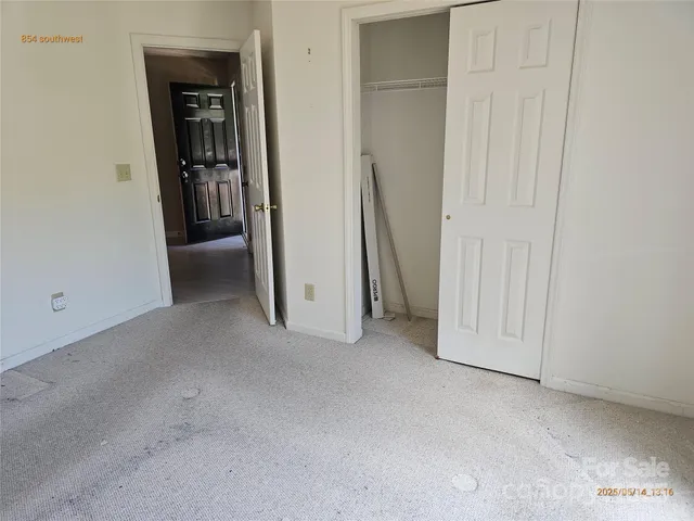 an empty room with closet