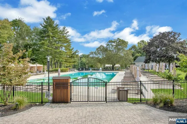 a view of a wrought iron fences in front of house