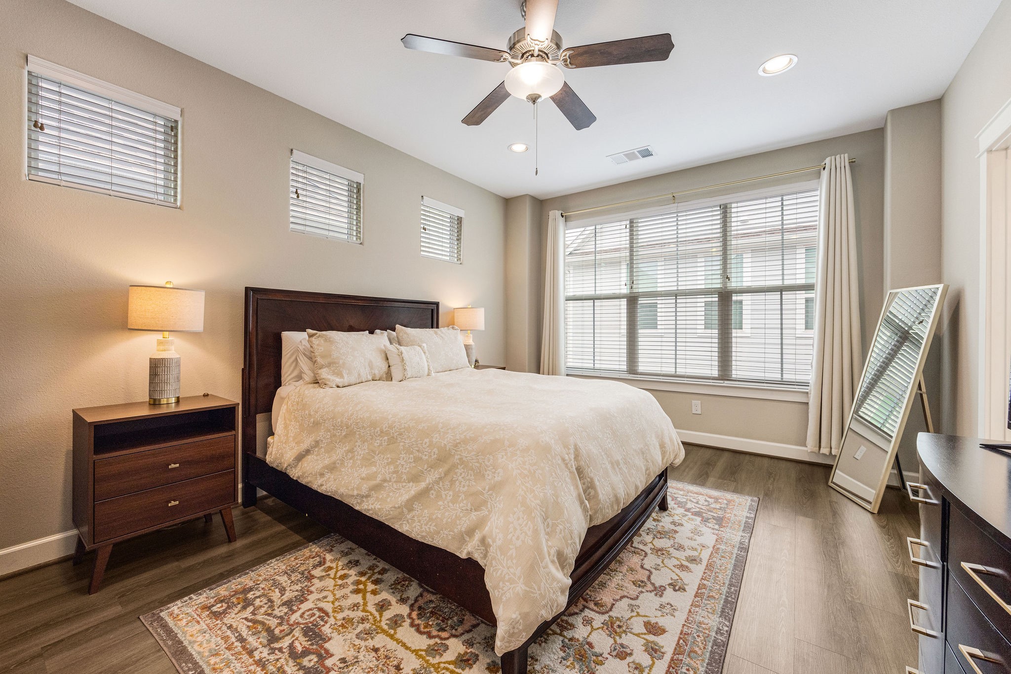603 Link Road, Unit F Houston, TX 77009 - Photo 7 of 16 Private third-floor primary suite with high ceilings and abundant natural light.