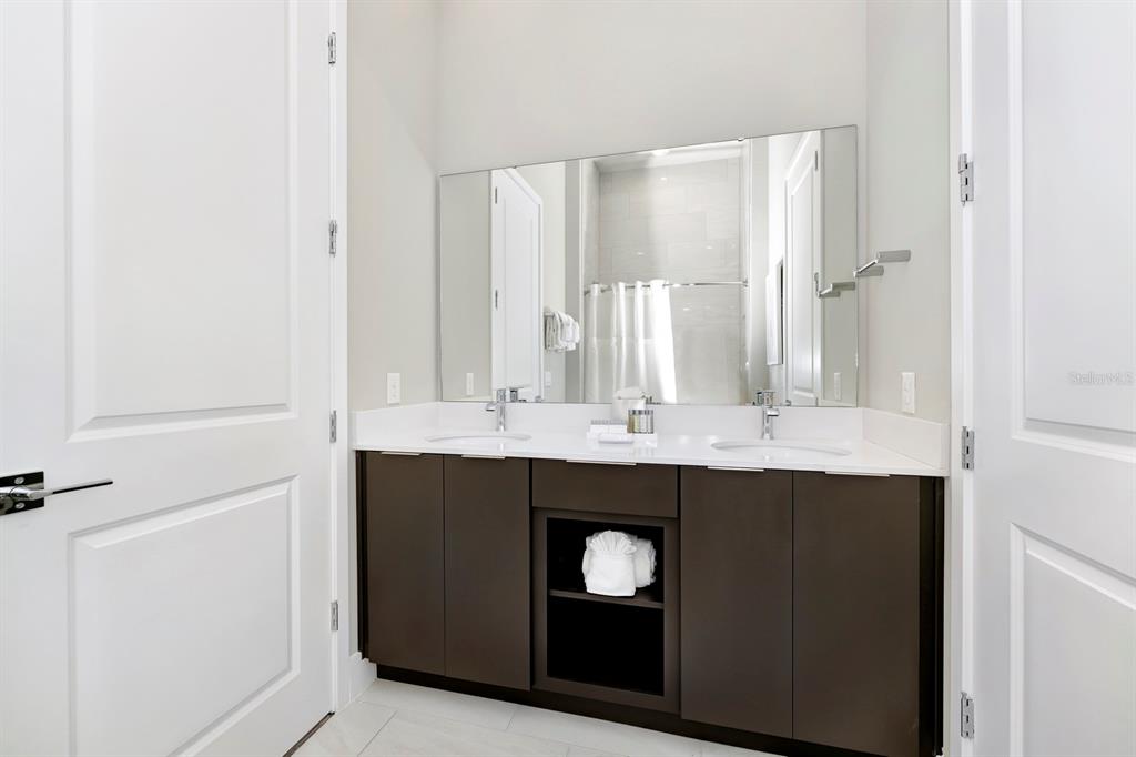 7740 Sandy Ridge Drive, Unit 220 Reunion, FL 34747 - Photo 29 of 55 a view of a kitchen with sink and cabinets