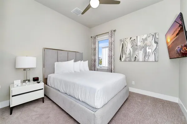 a view of wooden floor and windows in a room