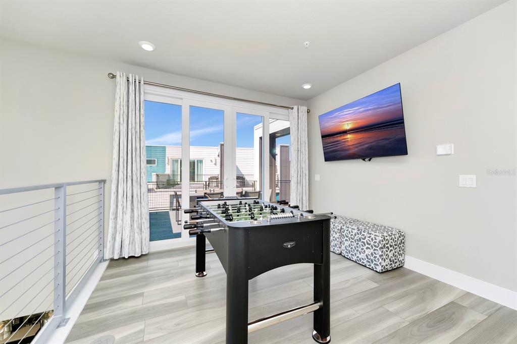 7740 Sandy Ridge Drive, Unit 220 Reunion, FL 34747 - Photo 34 of 55 a dining room with furniture and window