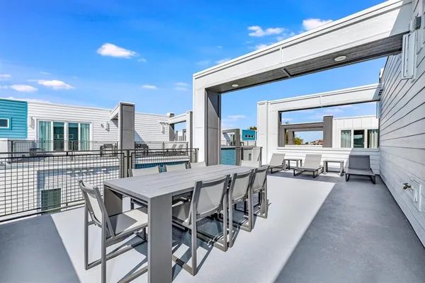 a building outdoor space with patio furniture