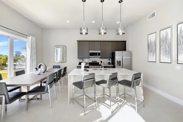 a view of a dining room with furniture window and outside view