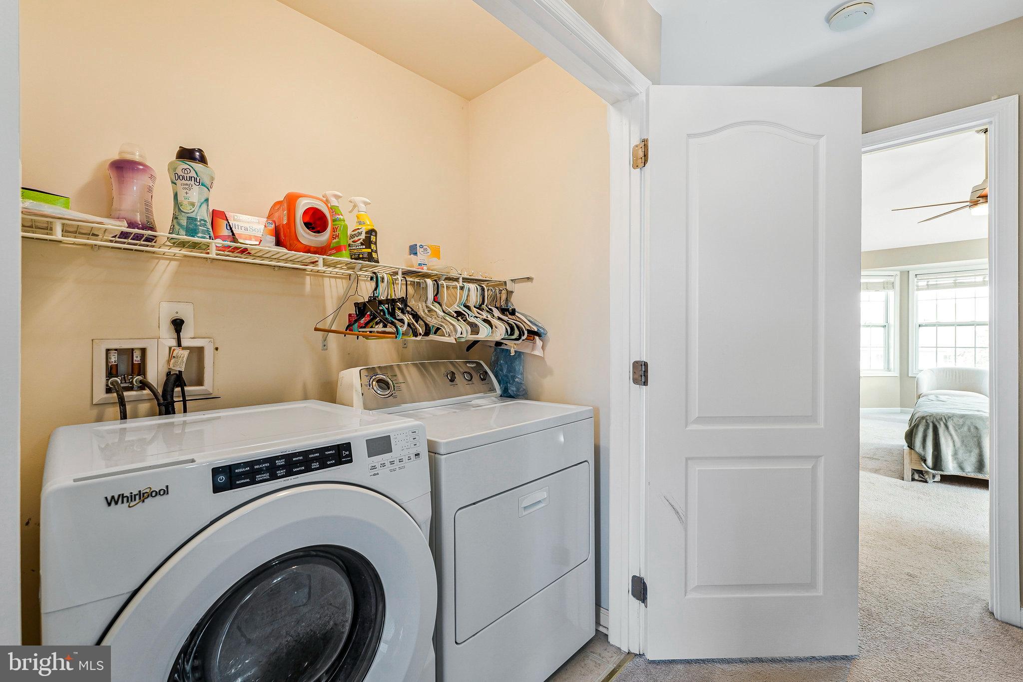 23073 Weybridge Square Broadlands, VA 20148 - Photo 20 of 24 a utility room with dryer and washer