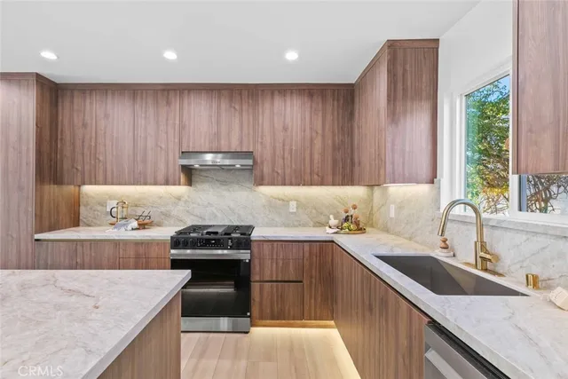 a bedroom with furniture and a fireplace