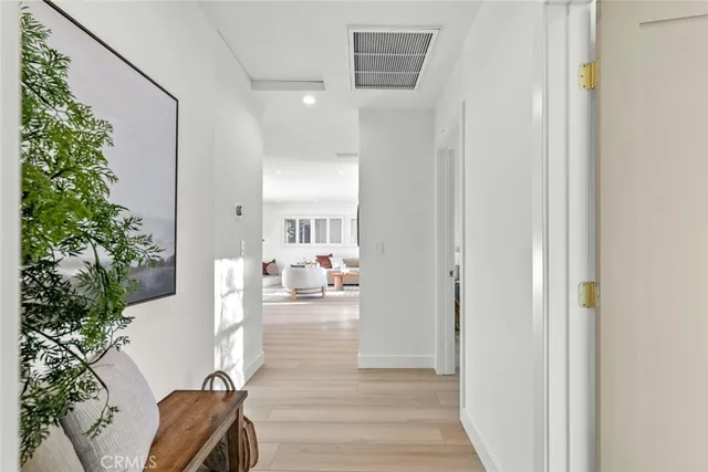 a bedroom with a large bed and a couch