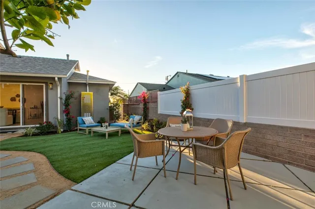 a picture of a bench in front of a gate