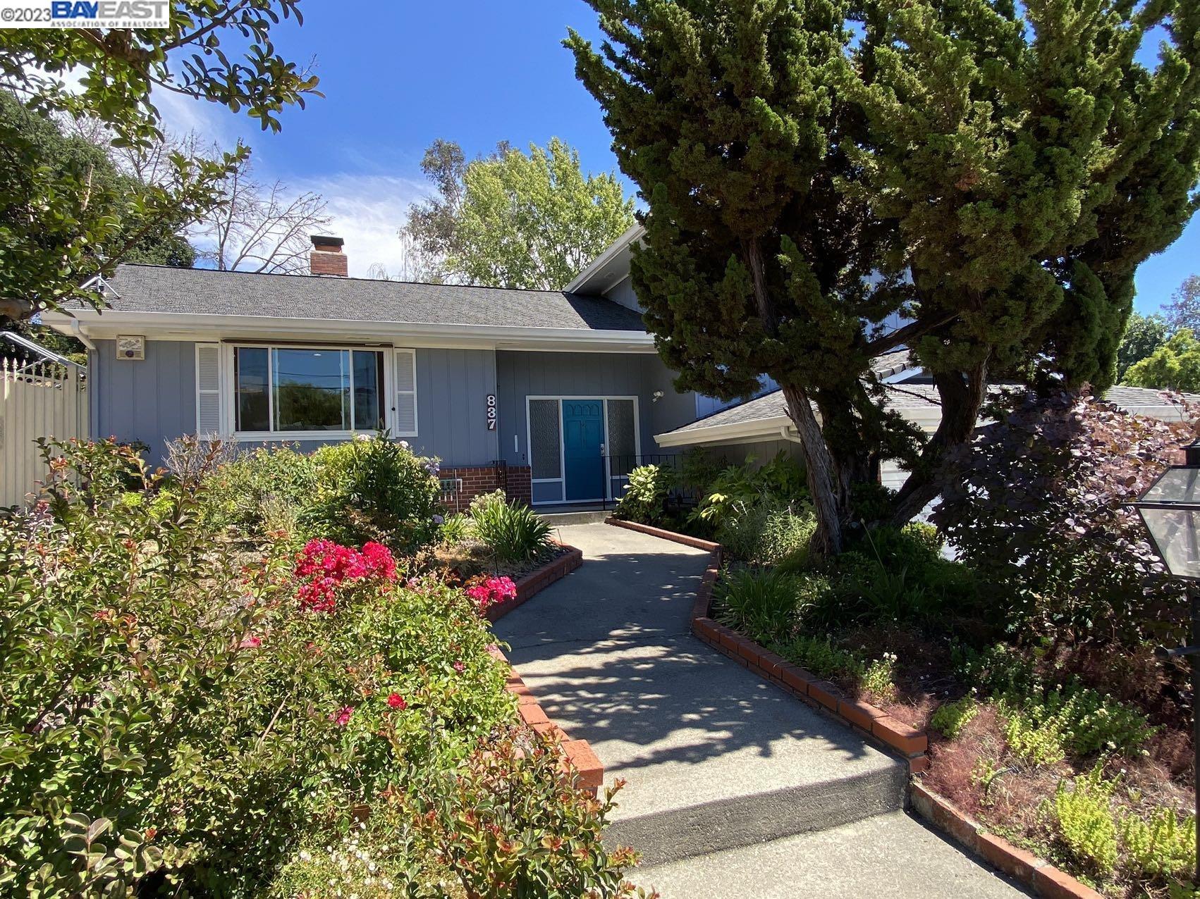 837 Hawthorne Drive Rodeo, CA 94572 - Photo 1 of 1 a view of a house with a garden