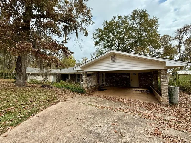 a fire hydrant in the middle of a field