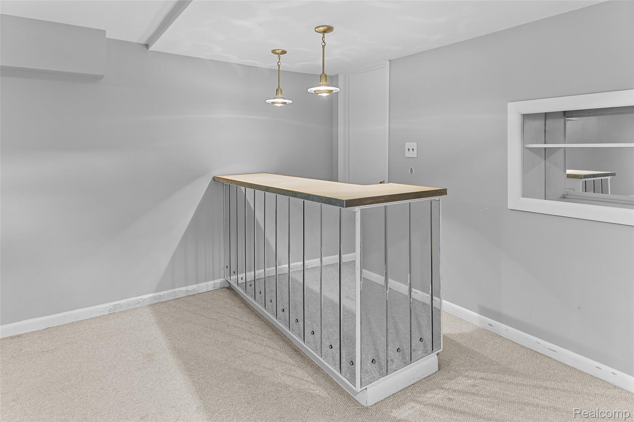 2345 Middlefield Road Trenton, MI 48183 - Photo 25 of 42 Finished portion of the basement, built in bar