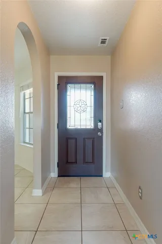 a view of an entryway with a window