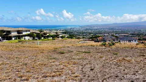 a view of a water with mountain in the background