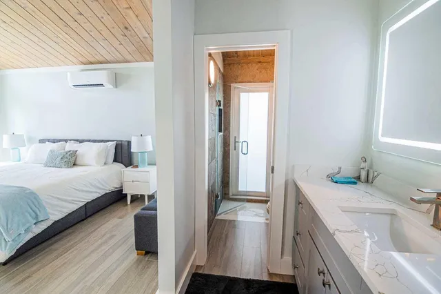 a bathroom with a sink and a mirror