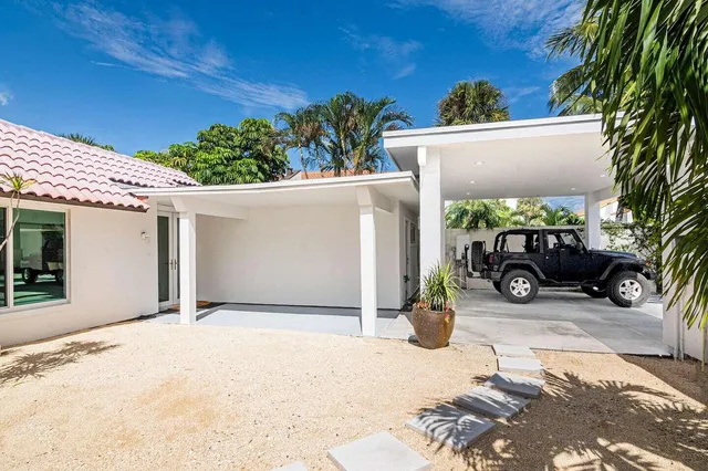 a vase of flowers sitting on a table
