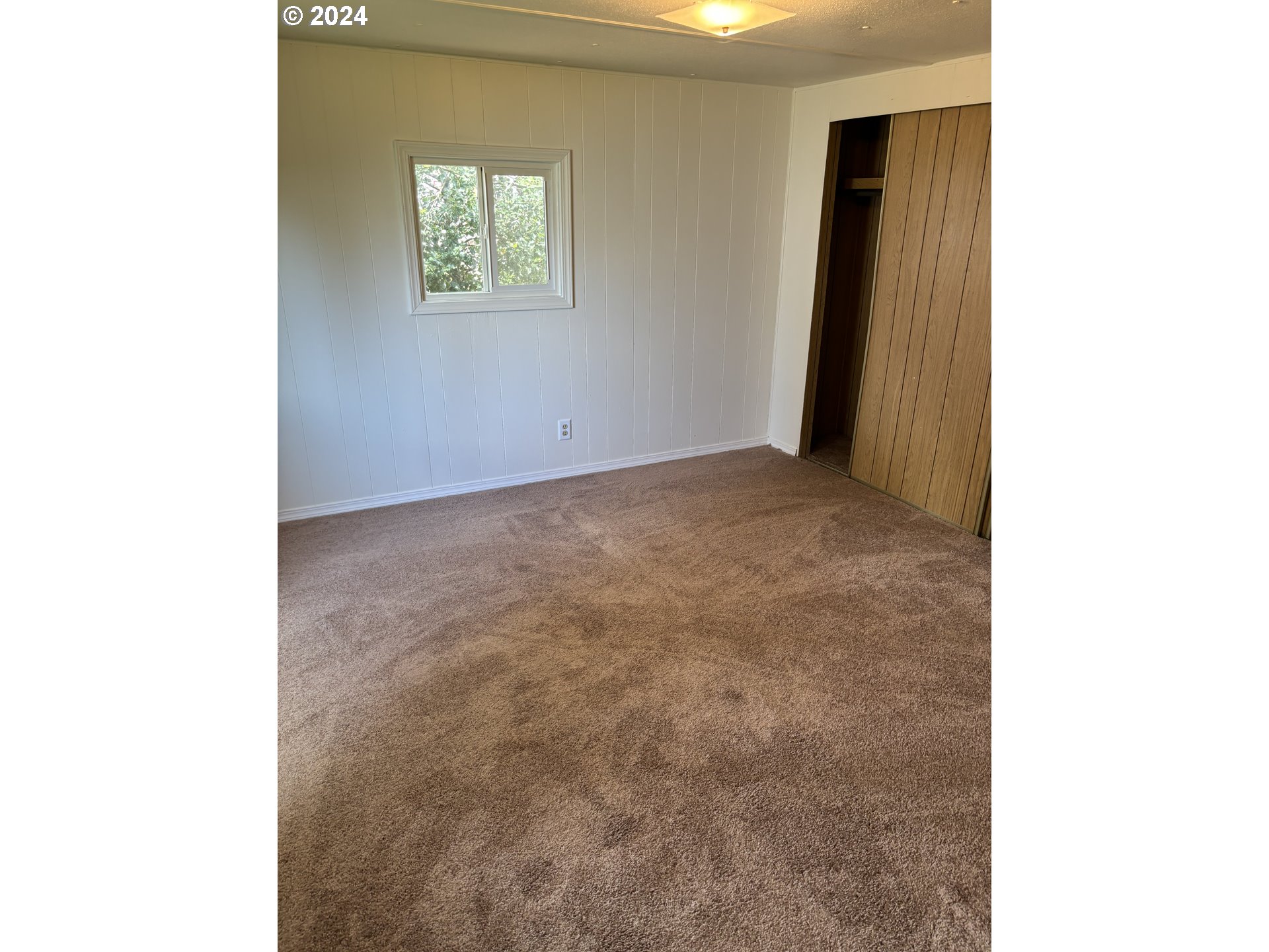 205 South 54th Street Springfield, OR 97478 - Photo 15 of 19 a view of an empty room with a window