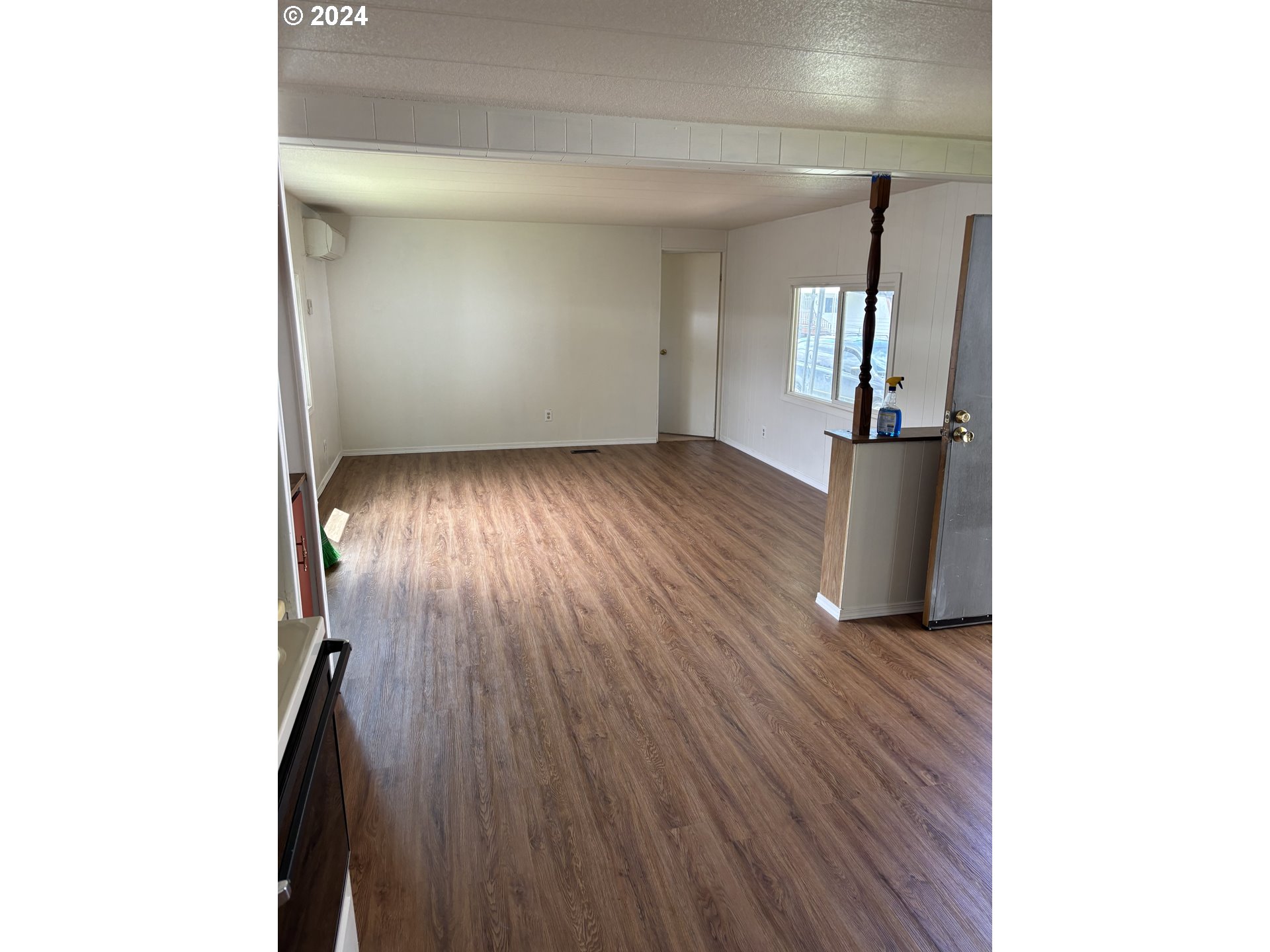 205 South 54th Street Springfield, OR 97478 - Photo 4 of 19 a view of entryway with wooden floor