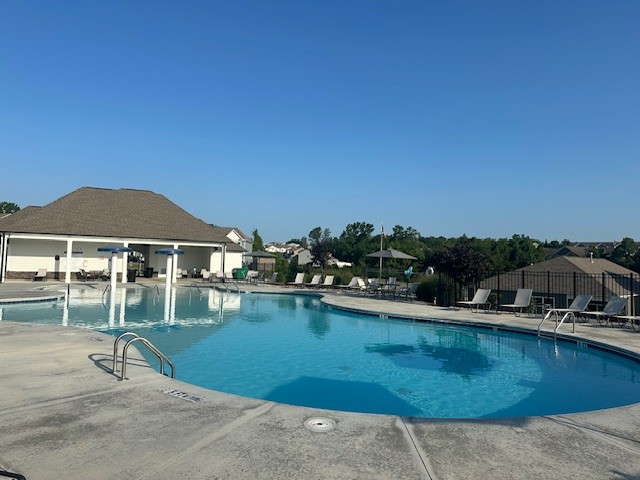 1315 Ruddy Way Lebanon, TN 37090 - Photo 16 of 29 a view of a swimming pool and lounge chairs