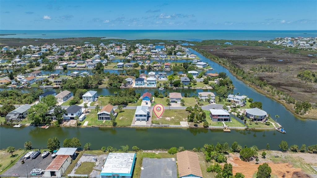 3398 Fernleaf Drive Hernando Beach, FL 34607 - Photo 3 of 11 view of an ocean with city