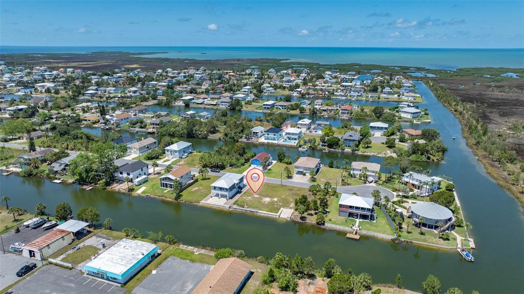3398 Fernleaf Drive Hernando Beach, FL 34607 - Photo 6 of 11 an aerial view of a house with a ocean view