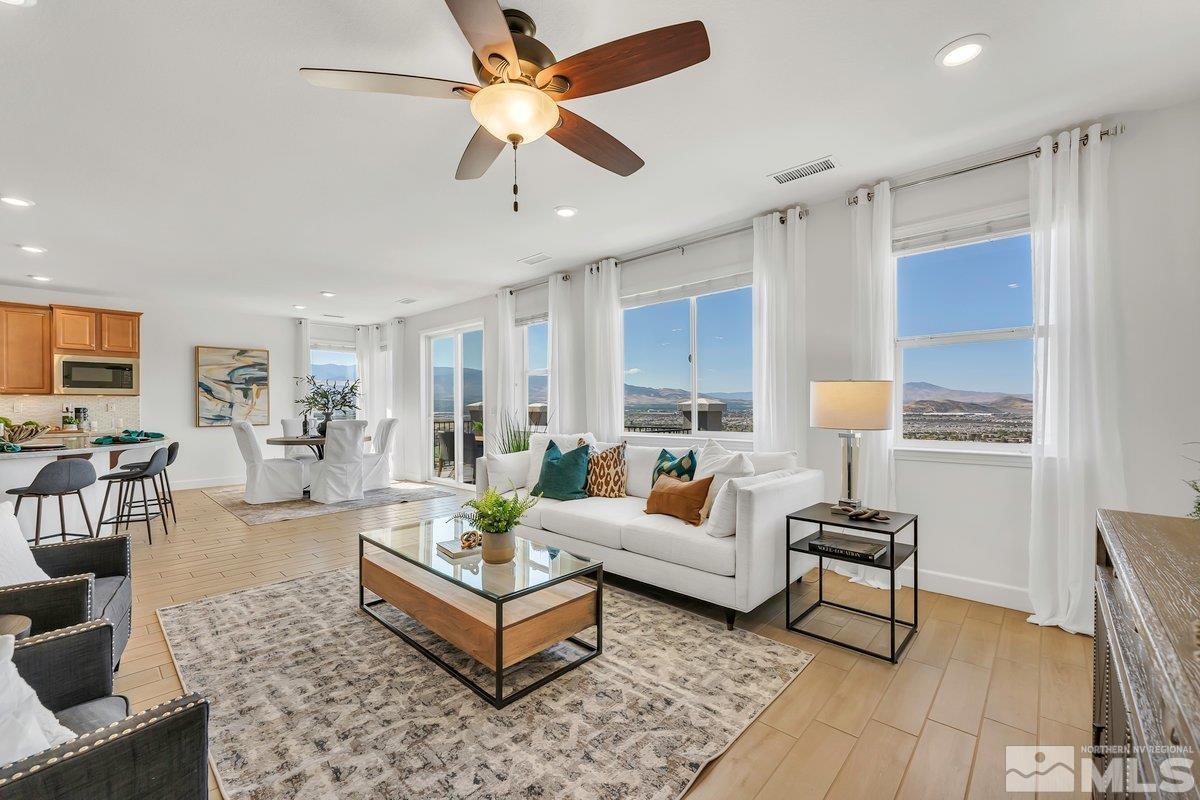 10537 Claim Jumper Way Reno, NV 89521 - Photo 15 of 40 a living room with furniture and a table