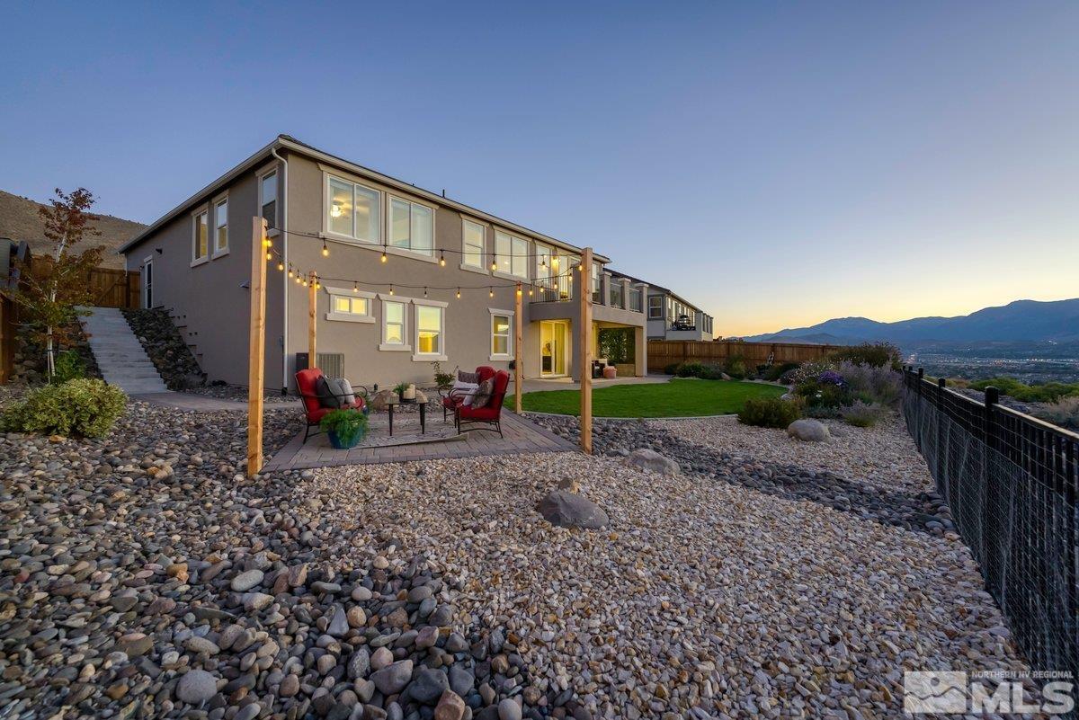 10537 Claim Jumper Way Reno, NV 89521 - Photo 30 of 40 a view of a house with a backyard