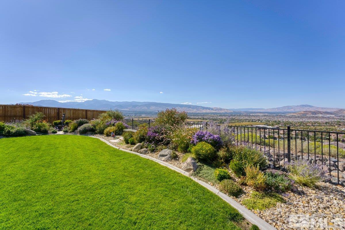 10537 Claim Jumper Way Reno, NV 89521 - Photo 38 of 40 a view of a lake with a garden
