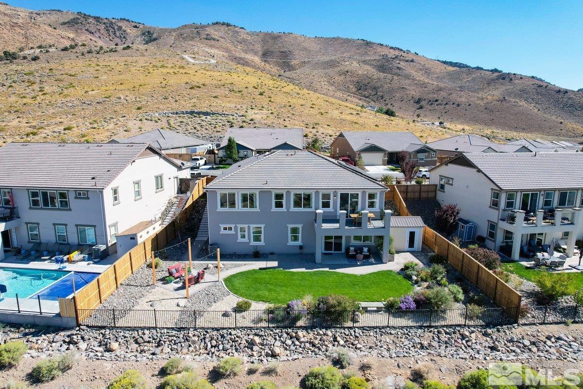 10537 Claim Jumper Way Reno, NV 89521 - Photo 39 of 40 a front view of a house with a yard