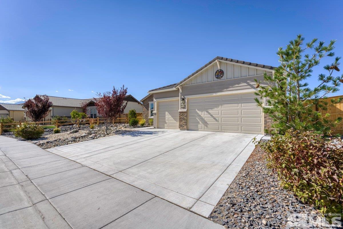 10537 Claim Jumper Way Reno, NV 89521 - Photo 5 of 40 a front view of a house with a yard