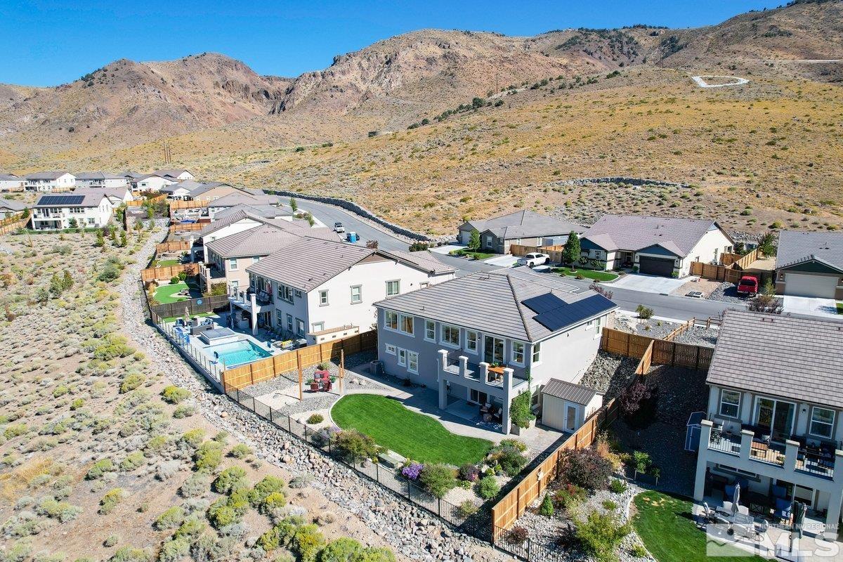 10537 Claim Jumper Way Reno, NV 89521 - Photo 8 of 40 an aerial view of residential houses with outdoor space