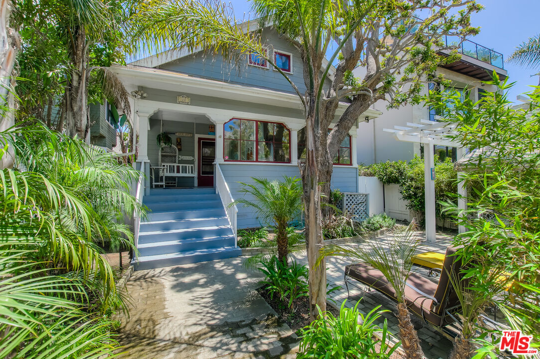 a view of house with outdoor seating