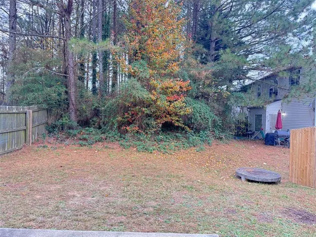 a view of a street with some trees