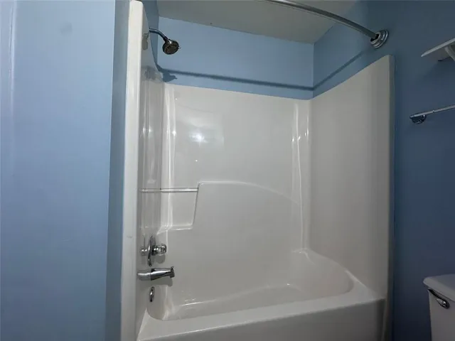 a close view of a bathtub in bathroom
