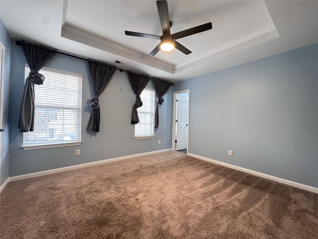 5495 Hampton Court Atlanta, GA 30349 - Photo 8 of 20 a view of an empty room with a window