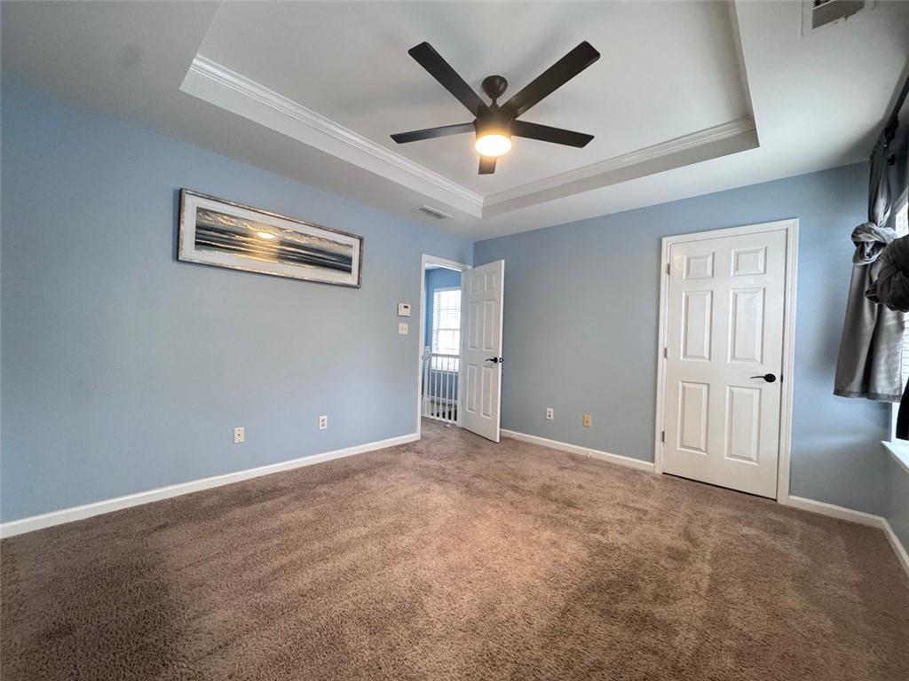 5495 Hampton Court Atlanta, GA 30349 - Photo 9 of 20 a view of an empty room with a window