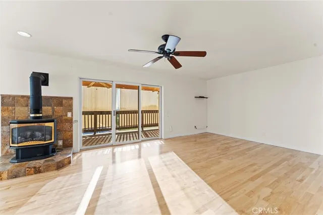 a kitchen with stainless steel appliances granite countertop a sink wooden cabinets and a granite counter tops