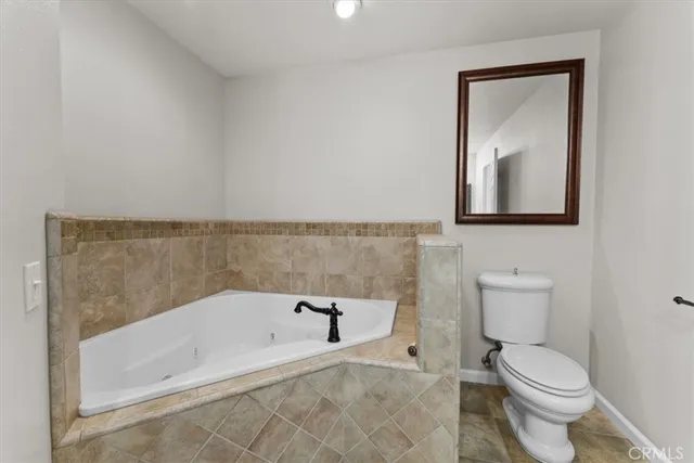 a view of a balcony with wooden floor