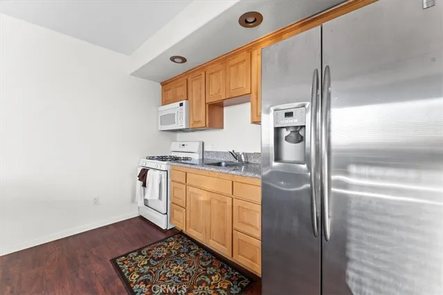 a view of a forest with lush green forest