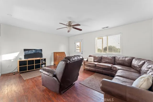 a view of a city with lush green forest
